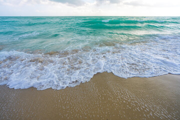 Beautiful sea pattern. Clean water surface. Calm ocean motion. Dramatic storm waves. Foamy wave texture. Outdoor beach scene. Clear turquoise sea. Serene holiday view. Wavy ocean design.