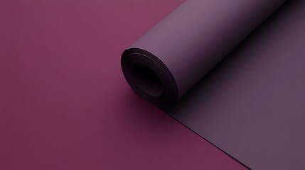 A rolled sheet of purple paper resting on a matching background.