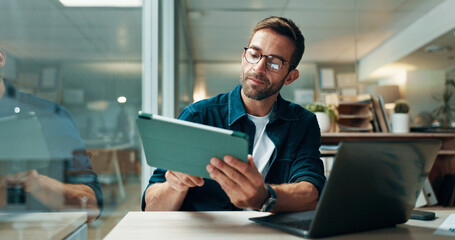 Tablet, glasses and laptop with business man in office for planning, ui designer and app review. Developer solutions, client feedback and research with person in agency for project idea and startup
