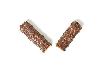 Top view of chocolate bar filled with wafer isolated on white background. Wafer chocolate caramel. Broken in half. Clipping path.