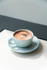 A cup of Coffee Chocolate Matcha hot iced cafe