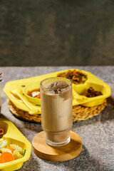 A cup of Coffee Chocolate Matcha hot iced cafe