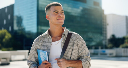 Happy, student and man in city thinking with books for travel to university, college and school campus. Smile, inspiration and person with backpack in town for future education, learning or knowledge