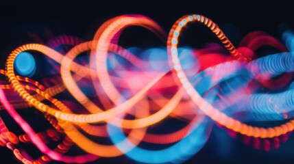 Vibrant Light Trails in Motion Creating Colorful Abstract Background