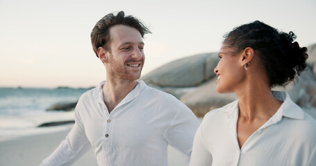 Vacation, travel and interracial couple at ocean for love, care and healthy relationship. Beach,...