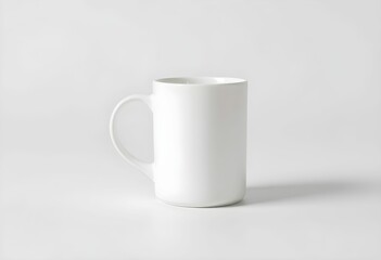 Fototapeta premium White ceramic mug, minimalist design, clean background, simple composition, product photography, soft lighting, matte finish, cylindrical shape, handle visible, neutral tones, studio shot