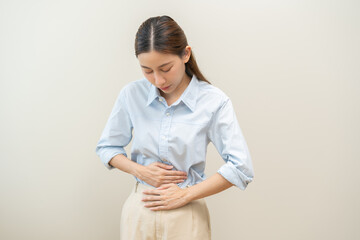 Flatulence asian young woman intolerance hand in stomach ache, suffer from food poisoning,...