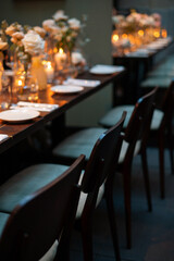 Elegant Dining Table with Flowers and Candles