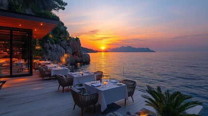 A terrace designed beautifully for a seafood restaurant, boasting breathtaking ocean views during a magical sunset, creating a perfect dining experience.