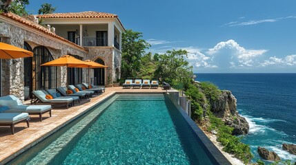 Fototapeta premium A coastal villa with breathtaking ocean views, perfectly positioned shaded sun loungers under colorful umbrellas alongside an infinity pool, luxurious and inviting.