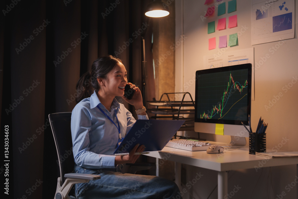 Aufkleber young businesswoman analyzing charts on a computer screen while discussing results with a colleague 