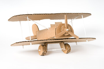 Creative DIY biplane made of cardboard, hand-crafted airplane model
