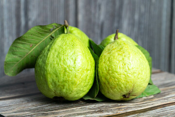 Fresh Tropical Guavas on a Wooden Surface – Natural and Organic