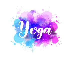 Yoga - handwritten modern calligraphy text on watercolor paint splash.