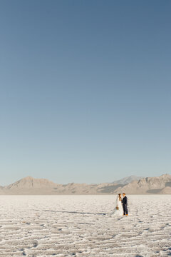 Romantic Bride and Groom Mountain Salt Flat scene
