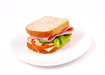 Healthy ham sandwich with cheese, tomatoes on white background