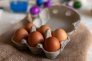 Chicken eggs in an egg carton. Homemade chicken eggs close-up. Easter eggs