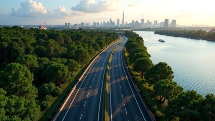 Fototapeta premium Aerial view of a smooth asphalt highway along a lake and sea.