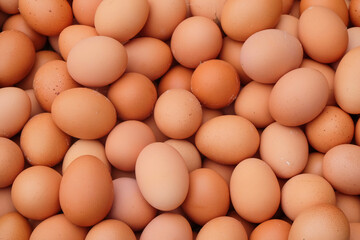 Abstract pattern and texture of a pile of chicken eggs. For graphic design, 3D rendering and banner background