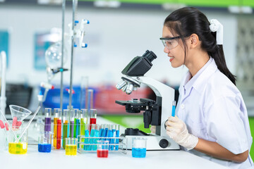Conducting in-depth research, Asian female scientists in the lab explored various techniques to...