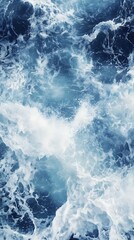 Obraz premium Turbulent ocean surface, white waves splashing, foam, abstract nature background, used for wallpaper