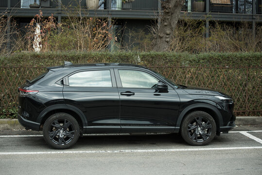 Basel - Switzerland- 18 march 2025 - profile view of black Honda HR-V suv car parked in the street