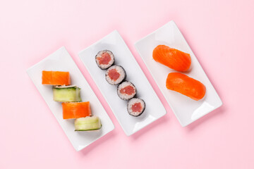 Assorted sushi and maki rolls beautifully arranged on plates