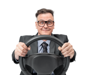 A man in a business suit with wide eyes and a smile holds a steering wheel, creating a driving effect, isolated on transparent background png.