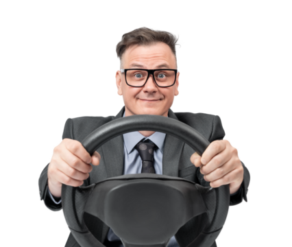 A man in a business suit with wide eyes and a smile holds a steering wheel, creating a driving effect, isolated on transparent background png.