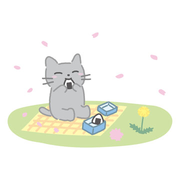 お花見でおにぎりを食べて春を満喫するねこイラスト