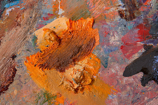 Colorful paint background with coarse texture in layers