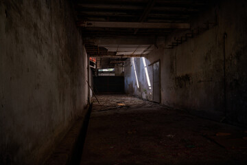 Derelict Warehouse with Broken Windows and Worn-Out Walls. Abandoned warehouse.
