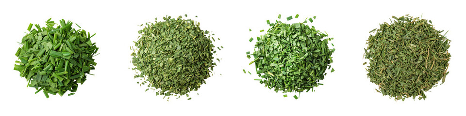 Obraz premium Overhead view of various fresh green culinary herbs like parsley chives dill and mint arranged in small piles on a white background