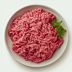 Freshly ground minced meat on a plate, perfect for various delicious recipes.