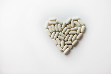 happy boy with his back sits on the seashore and throw stones family vacation, greece . High quality photo