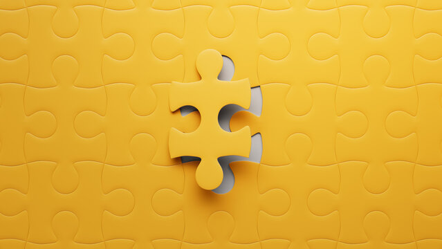Final Piece Falling into Place: A Striking Close-Up of a Yellow Jigsaw Puzzle