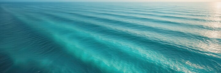 Obraz premium Turquoise Ocean Waves Pattern: Aerial View of Rippling Sea Surface