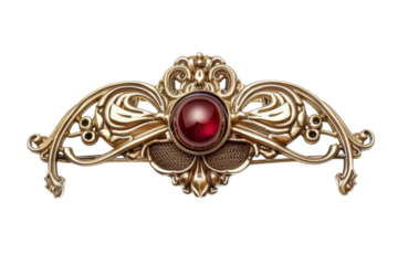 An ornate vintage brooch featuring an elegant design and a deep red gemstone, showcasing craftsmanship and historical charm