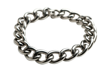 Obraz premium A shining silver chain bracelet rests elegantly on a smooth surface, capturing the light and showcasing its intricate links