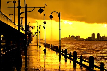 Golden Hour Storm for City Waterfront Promenade.