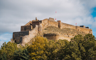 Ancient Gori Fortress in Georgia, overlooking the city and mountains — timeless history and Caucasus heritage