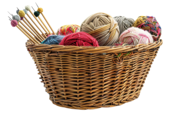 A colorful collection of yarn balls and knitting needles in a woven basket ready for creative crafting at home