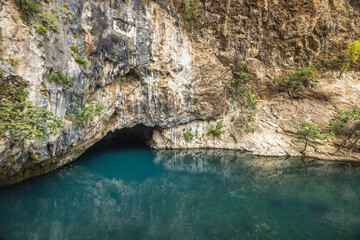 Buna river near the Blagaj Tekke monastery, Bosnia and Herzegovina, Europe. Cave opening at...