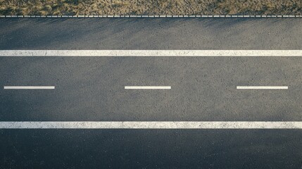 Fototapeta premium Aerial View of Straight Asphalt Road with Lane Markings