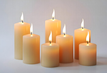 A serene and peaceful arrangement of candles in varying sizes, creating a warm, inviting atmosphere with soft, flickering flames.
