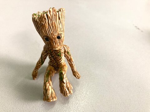 Yogyakarta, Indonesia - March 19, 2025: An action figure of Groot a character from the Guardians of the Galaxy movie isolated on white background