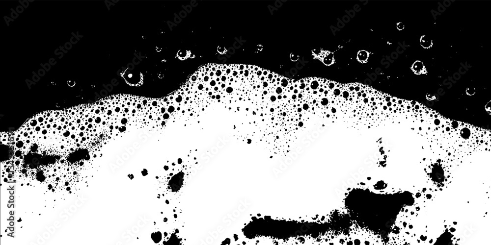 Aufkleber Intricate patterns of foam ripple across a dark surface, captivating the viewer with texture and contrast during a serene moment