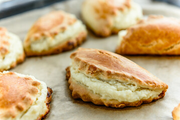 Homemade sochniki (sochni) with cottage cheese. Traditional Russian shortbread with cottage cheese.