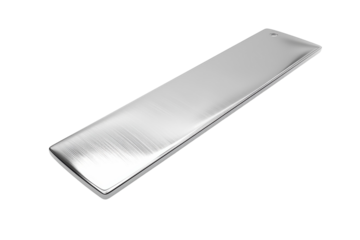 Sleek stainless steel ruler resting on a clean white surface with gentle light reflections