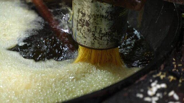 Making of Bengali spicy food chanachur.
